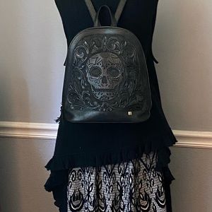 Carolina Rowley Mexican Tooled Leather Backed